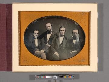 Charles Lyman Strong and three unidentified men in group portrait