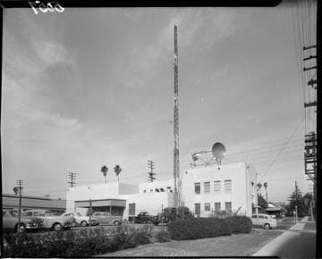 Switching Station building with radio antenna next to it