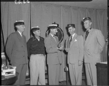 Passing the gavel at American Legion meeting hall