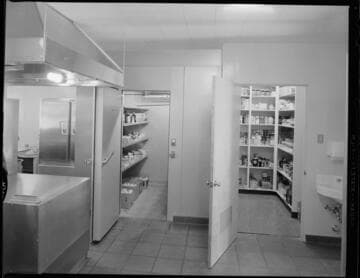 Institutional size kitchen with walk-in refrigerator and larder plus other interiors