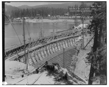 Big Creek Huntington Lake Dams - Dam #3, 15 days after concrete placement commenced.  [Background shows gravel plant and construction camp housing across the lake.] Job H