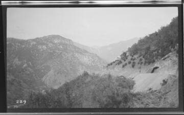 A man walking along the bench for the conduit at Kaweah #3 Hydro Plant