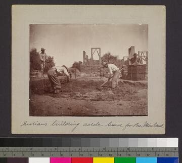 Indians building adobe house for Bro. Weinland