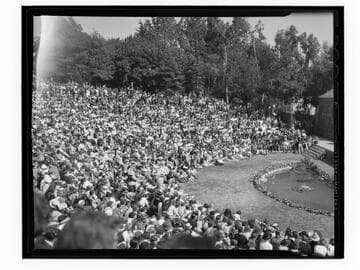 Audience attending play in the amphitheater at Santa Monica High School Fiesta