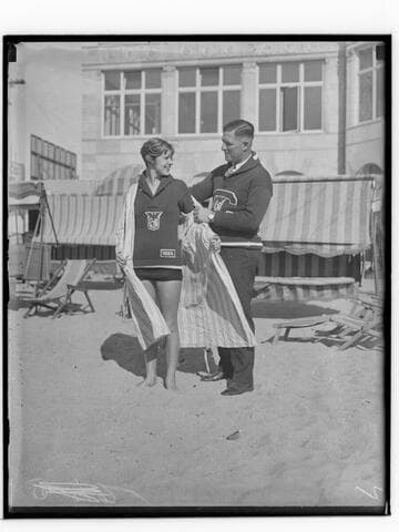 Lily May Bowmer with coach Frank Holborrow on the beach at Club Casa del Mar, Santa Monica, California