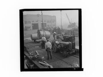 Rolls of newsprint unloaded at the dock, Port of Los Angeles