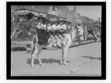 Meglin Kiddies riding a mule in front of Gables Beach Club, Santa Monica