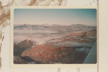 Across Toroweap Valley.  Mt. Emma upper left; Mt. Logan upper center; Mt. Trumbull upper right; Vulcans Throne lower left