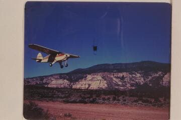Plane taking off from Navajo Mountain strip