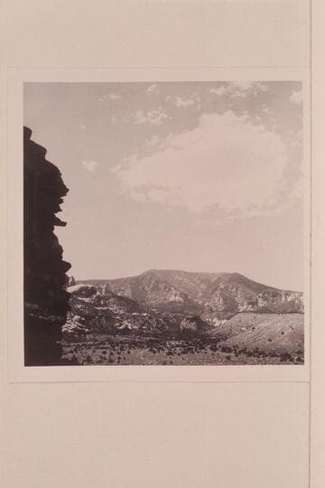 Across Trail Canyon to Navajo Mountain.  Ruin at left