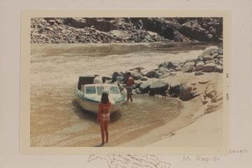 Party boat in eddy at Bridge Canyon Rapid, left bank
