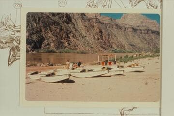 Gay Stavely's fleet of sadirons at Diamond Creek.  Stavely featured a cruise following Powell's course and ended at Diamond Creek in August.  The road had been washed by a flood and he left the craft on the beach