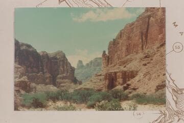 Up Kwagunt Canyon from mid-river.  Hutton Butte in distance