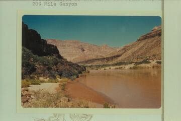 Upriver from mouth of 209 Mile Canyon in Granite Park.  The party started off the Sanup Plateau to travel Indian Canyon to the river but found they had been in 209 Mile Canyon
