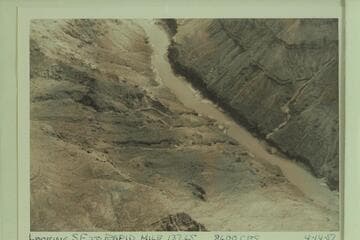 Looking southeast to rapid at Mile 137.65.  Approximate gauge:  8,600 cfs