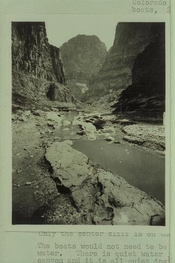 Kanab Canyon near mouth.  Cliffs in distance right and left are on the other side of the Colorado River.  The boats are the Powell boats.  2d Expedition