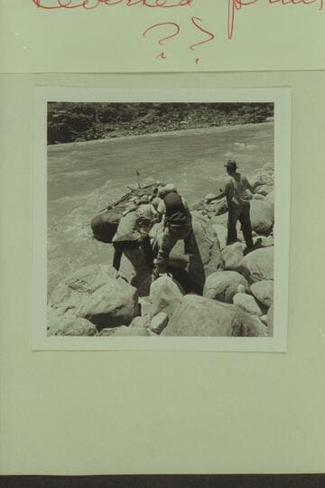 8.  Head of Lava Falls.  Lining Pontoon No. 2 down to be unloaded.  Fred, Dick, Jack, Bruce, Clarke and Harry