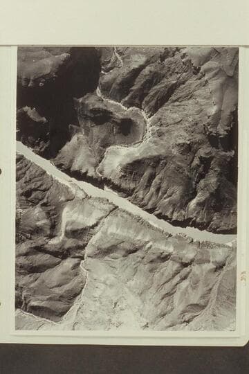 Bass Canyon upper center; Hotauta Canyon enters lower left; Bass Rapid at center.  The river enters from left at Mile 107.  Stanton's Switching Yard is right bank center
