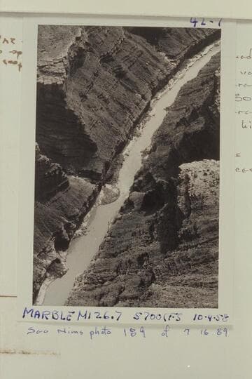 Down in Marble Canyon from Mile 26.2.  The rocky fan at the left bank is 27 Mile Rapid where the Stanton crew stopped for lunch in 1890, Jan., and the Hyde couple photographed each other in 1928, Nov