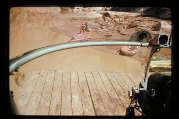 Chopper landing on dock; Marble Canyon Dam site