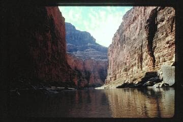 Down to dam site; cable and tunnel dump