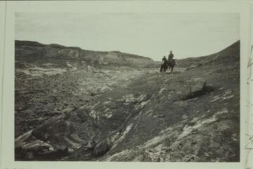 Masland and Ekker riding up the foot of the Angels Trail
