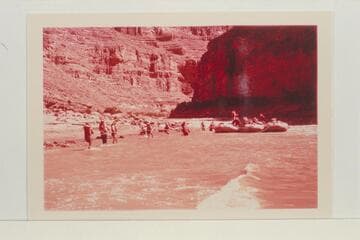 Dudes with Georgie White straining to land the three boloneys at the foot of Clearwater Rapid