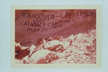 Painted memorial at the up-river side of Sheep Canyon, Mile 177