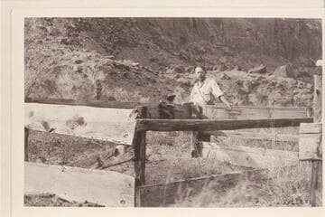 Charles Kelly at Cass Hite's grave, Tickaboo.  Cass Hite died in 1914