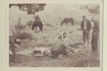 Breakfast at base camp north of 73.6.  Bill Belknap and Tom Daly are the chefs.  Chris Turner and Archeyes Masland are the hungry customers