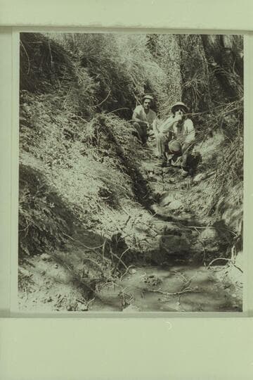 Guy Forcier and Ed Hudson by the spring which supplied the water for the still near Lava Creek, Grand Canyon