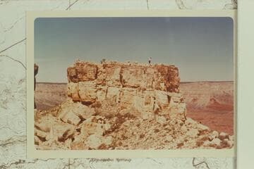 Bruce atop Enfilade Point walled ruin.  North with Fossil at left and Stanton Point at right