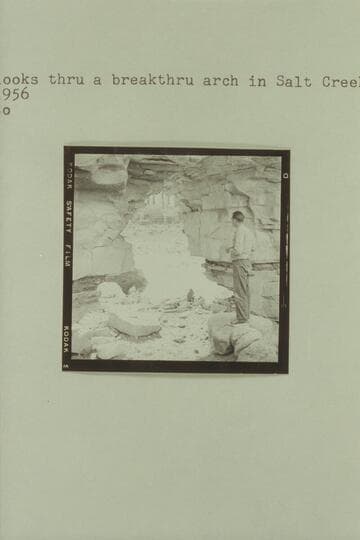 Kent Frost looks thru a breakthru arch in Salt Creek Canyon