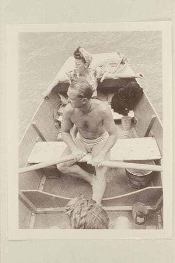 Pres and Becky Walker on the Dolores River.  They are riding in the "Rainbow Trail," one of the punts used by Nevills on the dude wrangling on the San Juan River