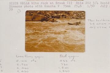 "Dixie Belle" hits rock at Break III, Mile 202 2/3 Rapid