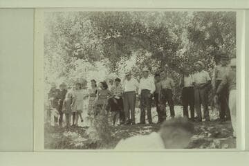 Townspeople of Moab watch departure of River party in 1945 [on reverse:  "Bridge at Moab, Utah"]