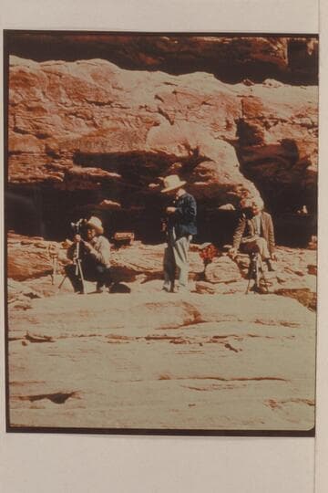 Frank Masland at the camera; Dock Marston with hand camera.  Joe Desloge watches.  The Needles