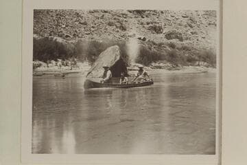 Bishop W. R. McConkie and Wayne McConkie taking Doris Nevills for a ride in their canoe between The Junction and the first rapid in Cataract Canyon