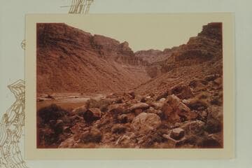 Up river from left bank at Mile 205.2.  The boulder at the left margin is at the mouth of Wide Valley at Mile 205.3 and is in Nims photo 76