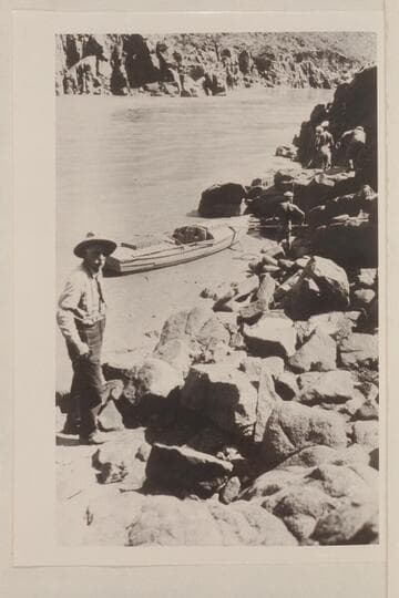 Photo No. 58, Lint album.  Foot of Bass Trail.  Mr. Bass at left.  The pack train arrived about noon of 1923, Sep. 02.  The river was rising