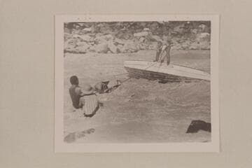 Millie Baker coming ashore from the rock-trapped Mexican Hat II [Mile 105]