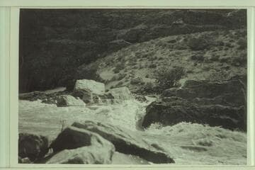 USGS boat in what the party named Loper Rapid in Ladore Canyon