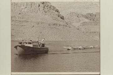Boat piloted by Buzz Holmstrom towing the three Nevills sadirons after meeting the party about 5 miles above Emory [sic] Falls