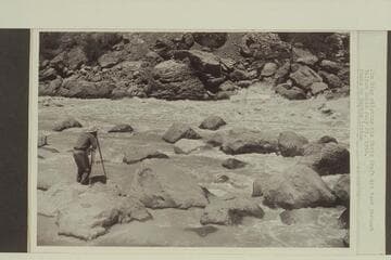 Jim Rigg piloting his Chris Craft kit boat through Vulcan Rapid