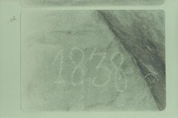 The D I 1838 inscription at Mile 221-222 at head of Whirlpool Canyon.  Photo after Glade Ross had gone over the lines with a soft rock.  He "noticed the inscription was put in with what appeared to be a dull center punch."