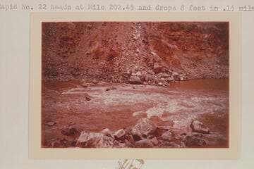 The lower drop of Rapid No. 22.  The Sliced Boulder is right of center