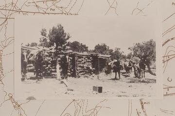 Camp Flint near Lands End on Todilto Formation.  Ned Chaffin is at right.  Horses:  Cox, Coly, Spud, Fan, Baldy, Pinto.  Pinto was favorite saddle horse of H. W. C. Prommel