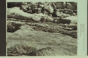 Buzz Belknap runs Gneiss Canyon Rapid in Sportyak