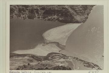 The mouth of the Grand Wash silted in.  The photo clearly shows how extended reservoirs are sealed off by silt bars across their mouths and left to die on the vine