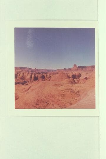 Anasazi Canyon in middle distance; Glen Canyon in distance.  Lion Rock.  Cummings Mesa on skyline at left.  From near top to west of the head of the joint